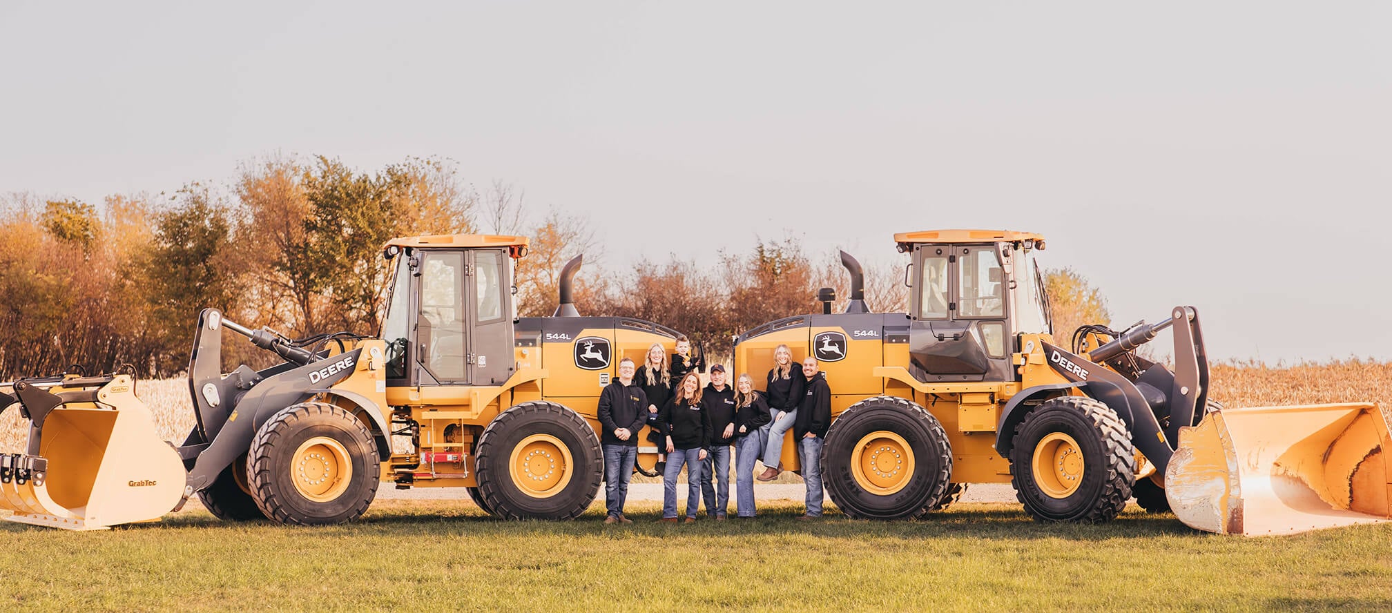 TG Equipment landscape family photo